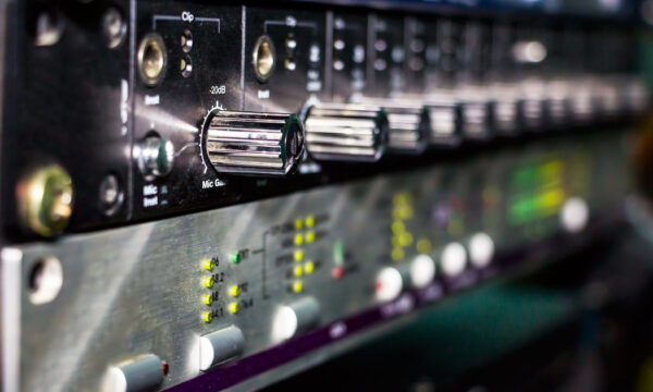 Recording studio gears in rack close up. Selective focus